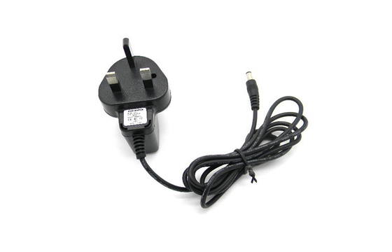 ब्रिटेन प्लग के साथ दीवार माउंट पावर एडाप्टर ओवर वोल्टेज स्विचन DC6V 500mA