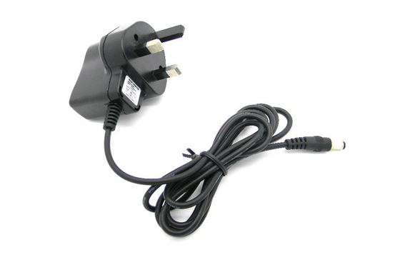 ब्रिटेन प्लग के साथ दीवार माउंट पावर एडाप्टर ओवर वोल्टेज स्विचन DC6V 500mA