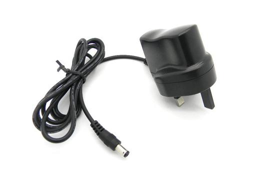 ब्रिटेन प्लग के साथ दीवार माउंट पावर एडाप्टर ओवर वोल्टेज स्विचन DC6V 500mA