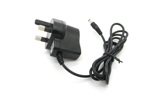 ब्रिटेन प्लग के साथ दीवार माउंट पावर एडाप्टर ओवर वोल्टेज स्विचन DC6V 500mA